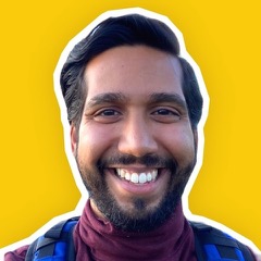 Cut-out of a smiling bearded man wearing a purple scarf against a yellow background.